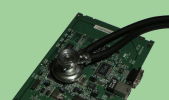 picture of RT311 router mainboard with stethoscope on it